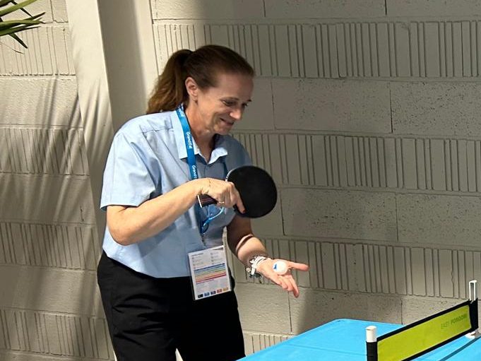 Sandy Nash taking a short break while officiating at a table tennis competition