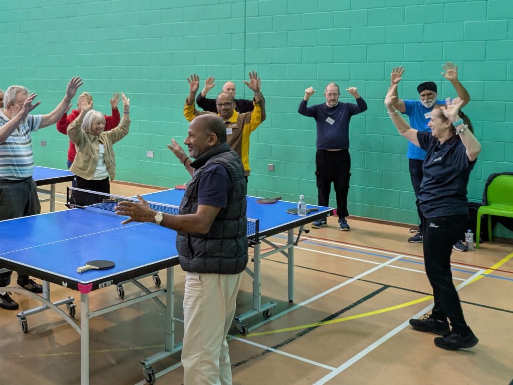 Sandy Nash coaching a table tennis group