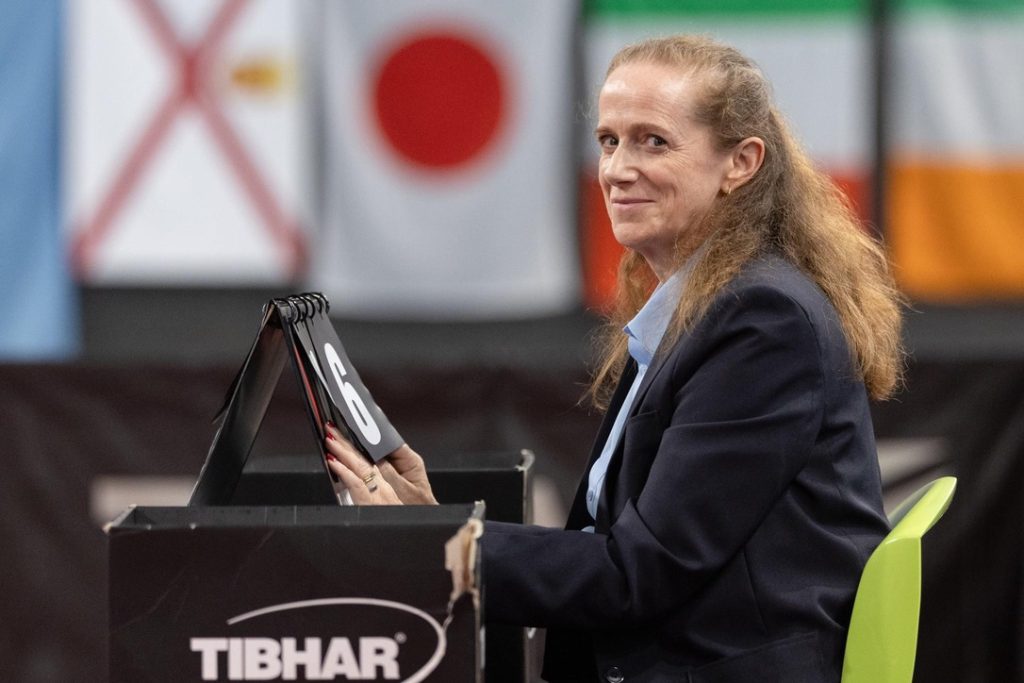Sandy Nash umpiring at international event